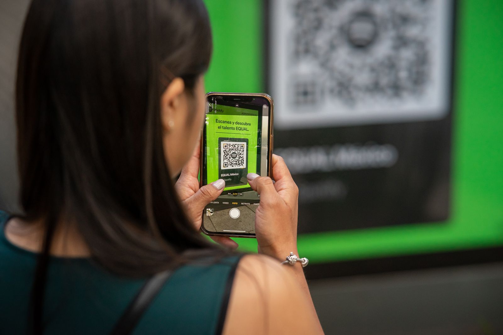 a guest scanning a QR code with their phone