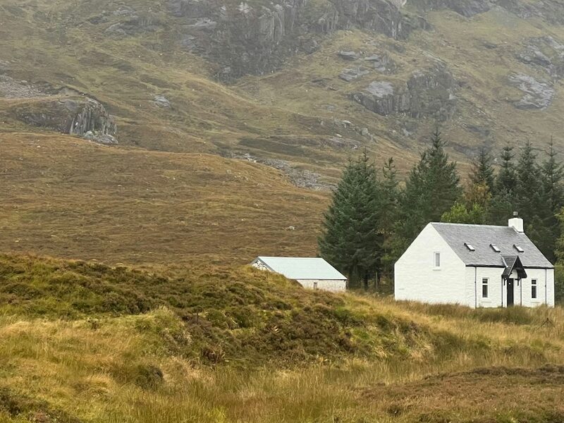 White Highland cottage sitting alone under the hillside at Glencoe